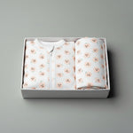 Baby onesie with a pattern on a gray background